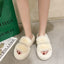- Women’s Fuzzy Slippers